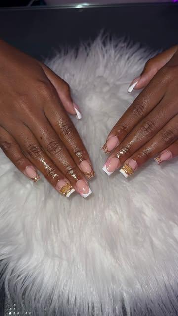 Milky French tips with gold cuffs